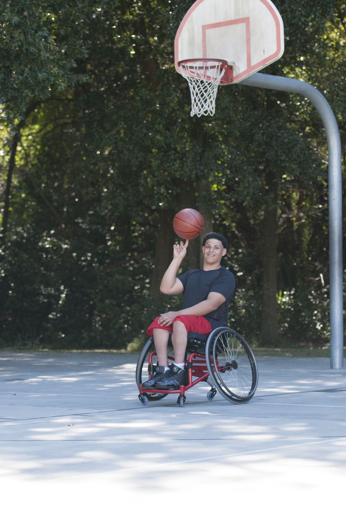 A man plays wheelchair basketball